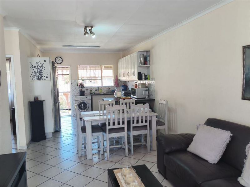 Neat Two-Bedroom Home with Double Pool and Carport - Photo 2