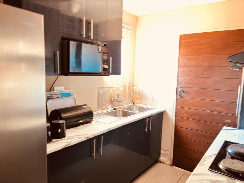 Stunning and affordable 2 bedroom house with a garage and built - in cupboards, for sale in Sky City Alberton.  - Photo 2