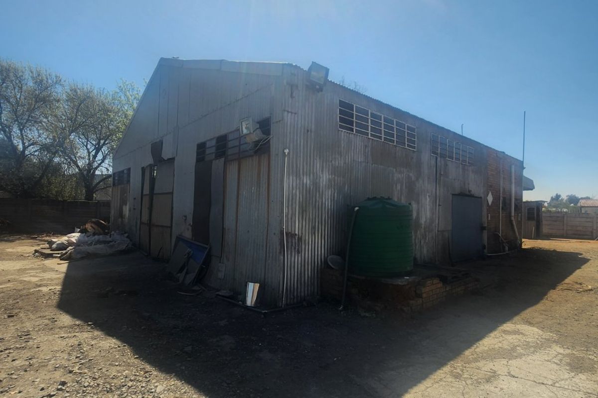 Prime Industrial Property with Offices, Warehouse, and Boardroom! - Photo 2