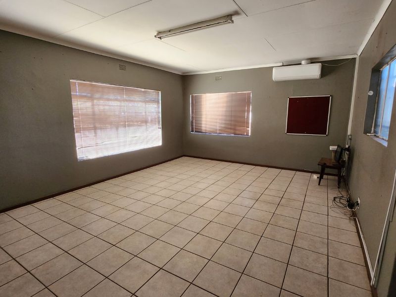 Prime Industrial Property with Offices, Warehouse, and Boardroom! - Photo 9