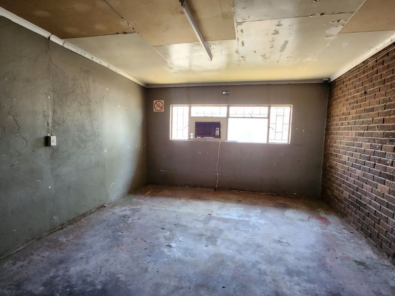 Prime Industrial Property with Offices, Warehouse, and Boardroom! - Photo 8