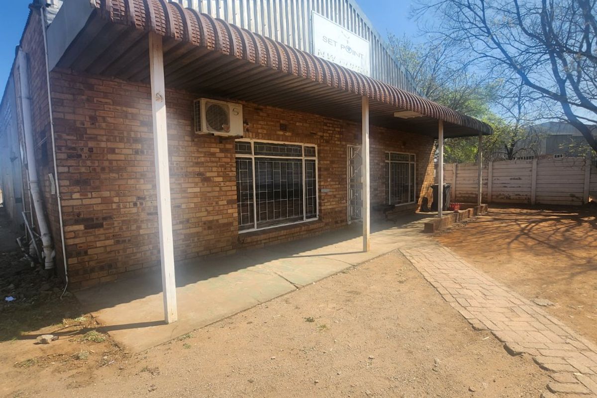 Prime Industrial Property with Offices, Warehouse, and Boardroom! - Photo 3