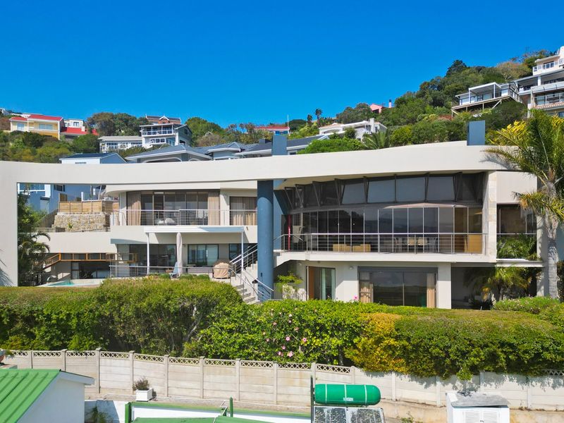 Follow the sun and enjoy this warm and sunny Knysna Heads home - Photo 4