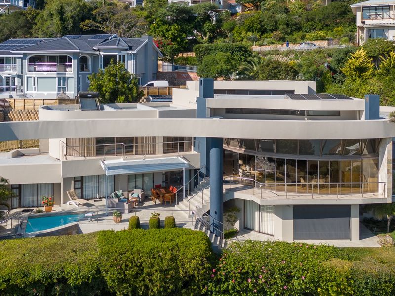 Follow the sun and enjoy this warm and sunny Knysna Heads home - Photo 5