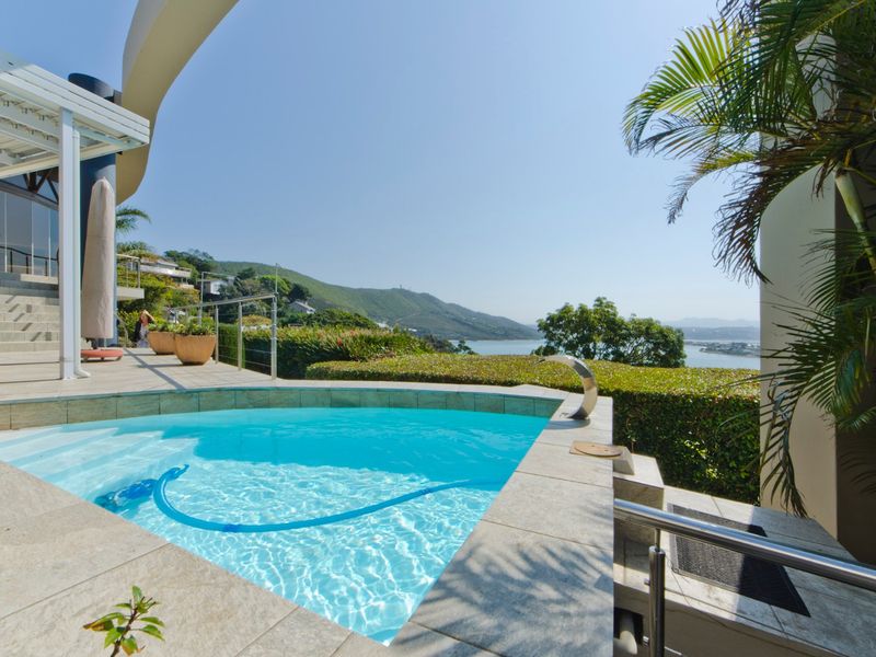 Follow the sun and enjoy this warm and sunny Knysna Heads home - Photo 6