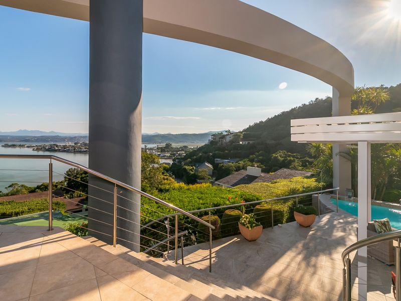 Follow the sun and enjoy this warm and sunny Knysna Heads home - Photo 8