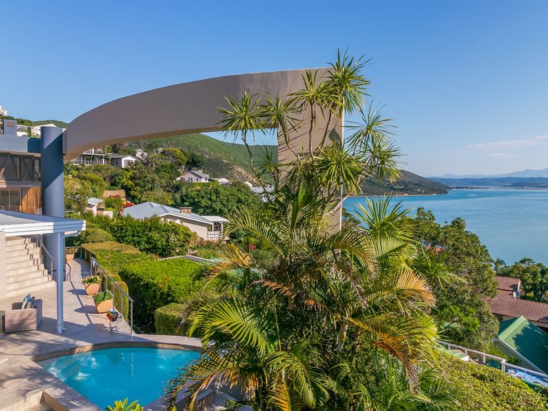 Follow the sun and enjoy this warm and sunny Knysna Heads home - Photo 7