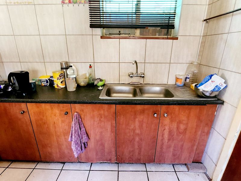 This affordalbe 3-bedroom home offers character, comfort, and a secure garden for family living. - Photo 7