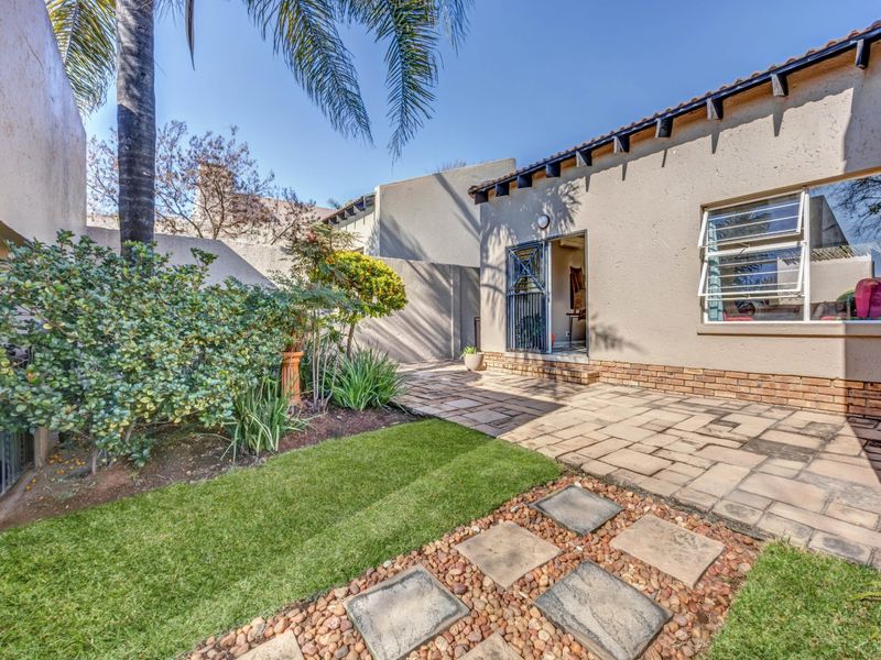 PRICED TO GO! 2 Bed, 2 Bath Townhouse with Double Auto Garage in a Premier Secure Complex - Photo 2