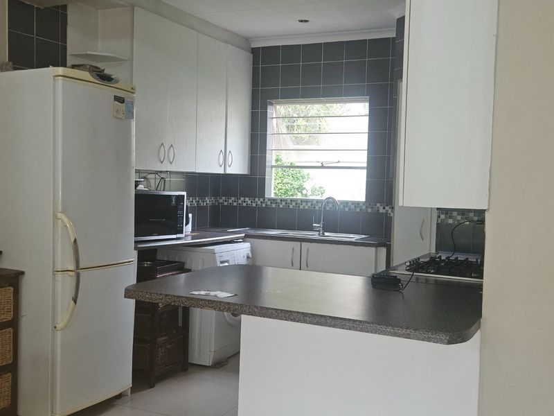 PRICED TO GO! 2 Bed, 2 Bath Townhouse with Double Auto Garage in a Premier Secure Complex - Photo 8