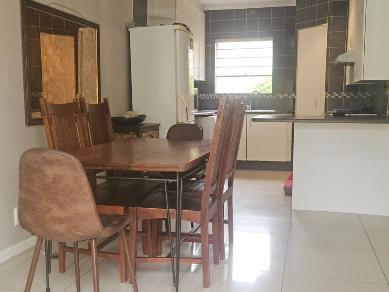 PRICED TO GO! 2 Bed, 2 Bath Townhouse with Double Auto Garage in a Premier Secure Complex - Photo 4