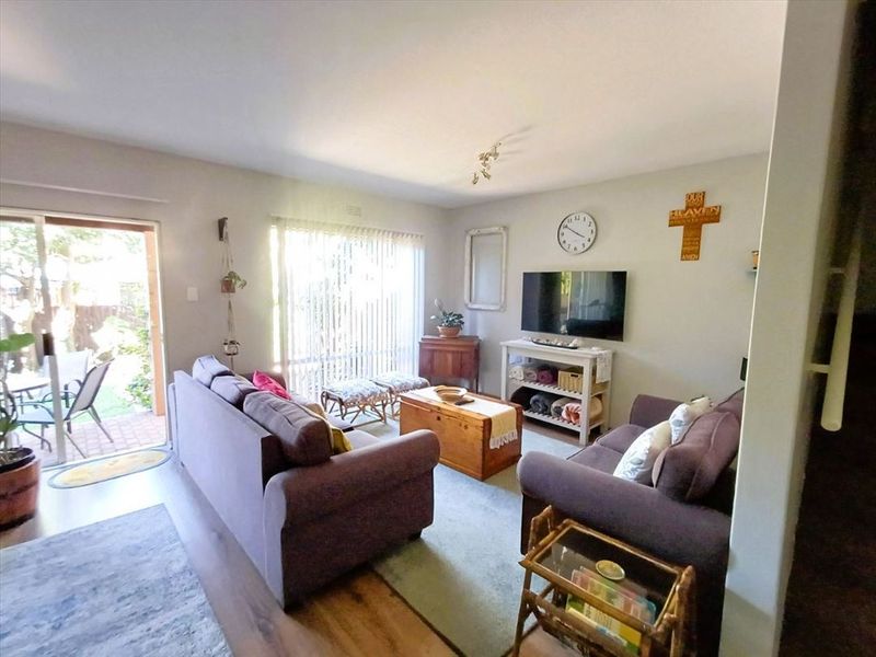 Charming Family Home with Comfortable Living Spaces - Photo 2