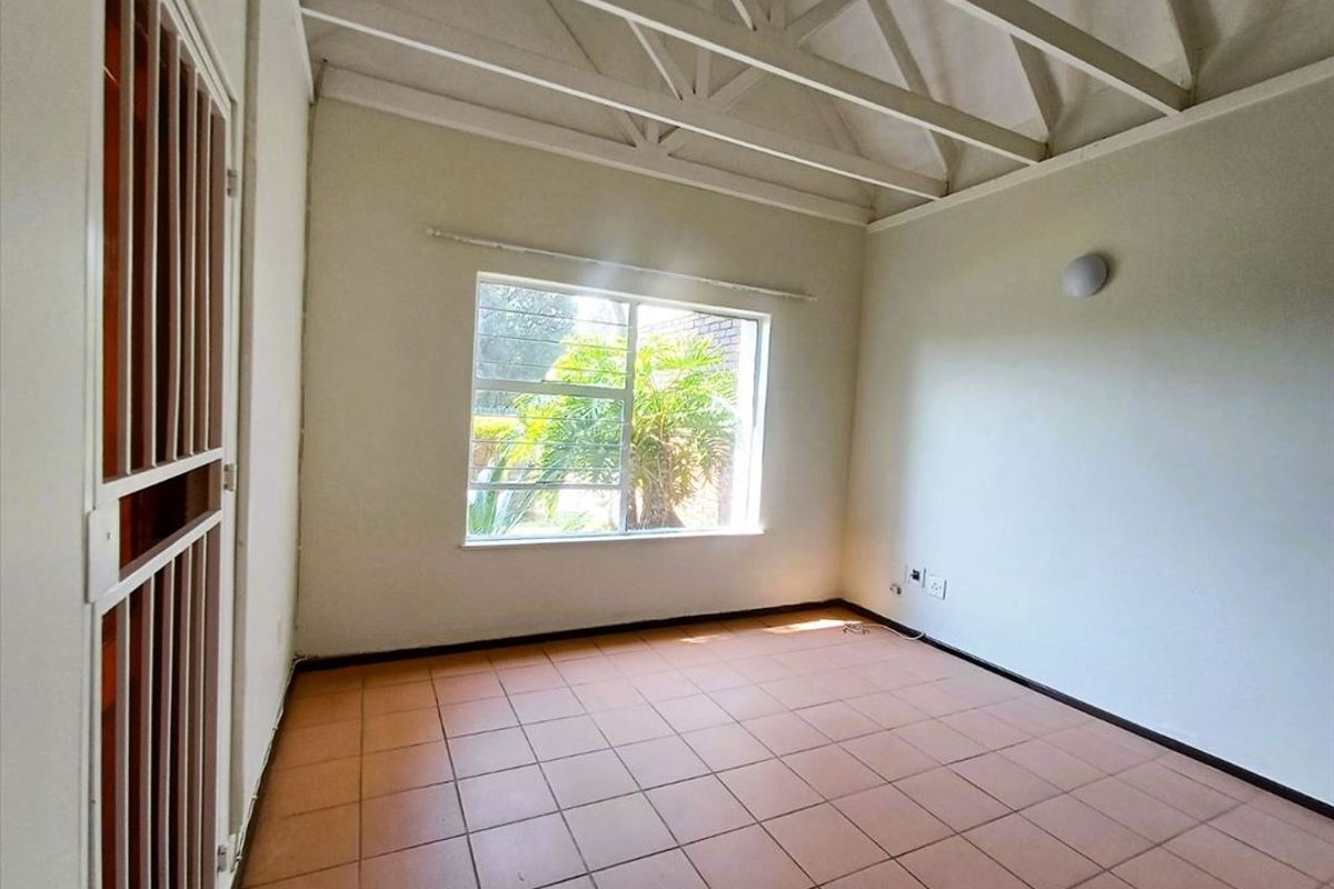 Cozy Two-Bedroom Home with Pool and Carport - Photo 2