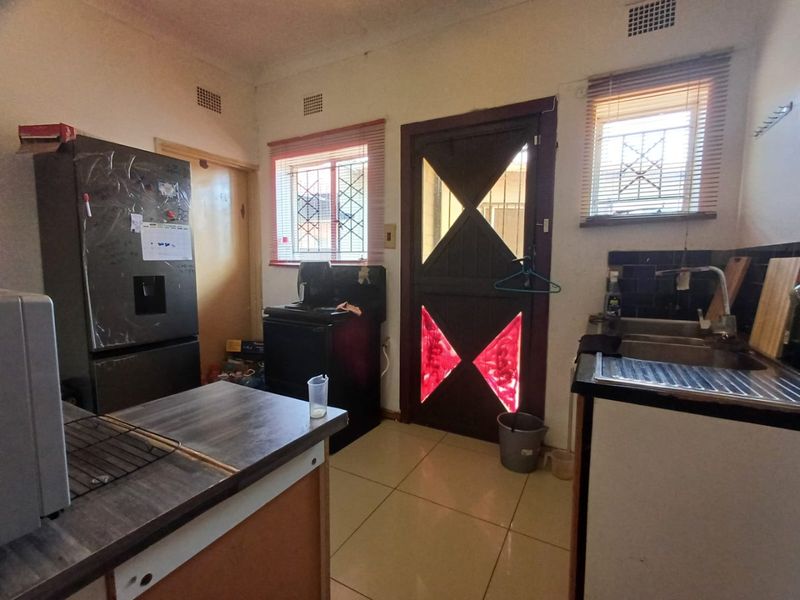 Charming Three-Bedroom Home with Income-Generating Flatlet in Stilfontein Ext 4 - Photo 7