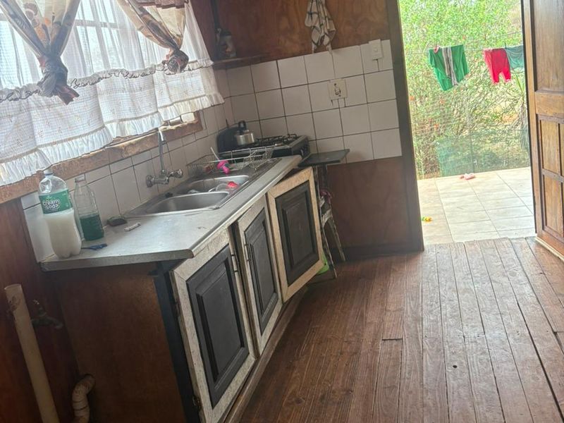 Plot with 3 wooden houses and one brick house located in the bushveld. - Photo 7