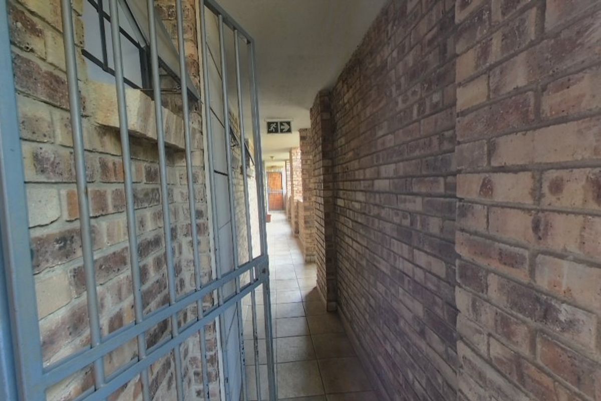 **Priced to Sell***  Stylish and Secure 2-Bedroom Apartment in Rooihuiskraal North - Photo 3