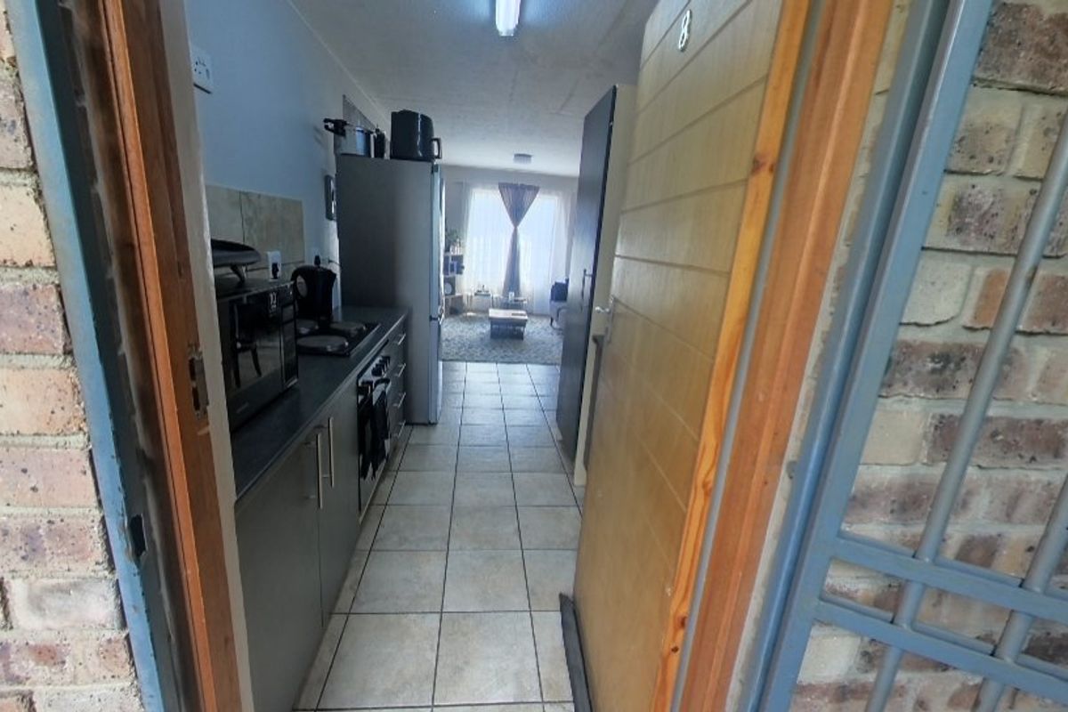 **Priced to Sell***  Stylish and Secure 2-Bedroom Apartment in Rooihuiskraal North - Photo 4
