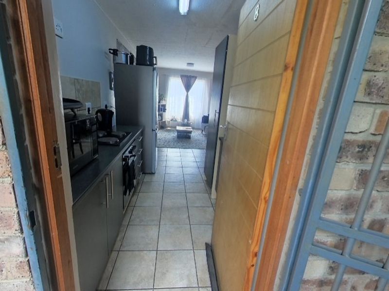 **Priced to Sell***  Stylish and Secure 2-Bedroom Apartment in Rooihuiskraal North - Photo 4