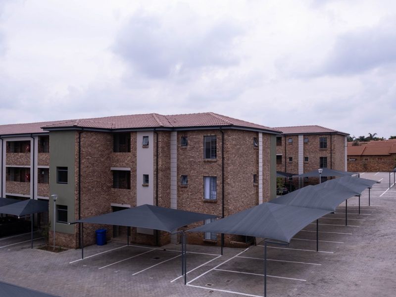 **Priced to Sell***  Stylish and Secure 2-Bedroom Apartment in Rooihuiskraal North - Photo 2