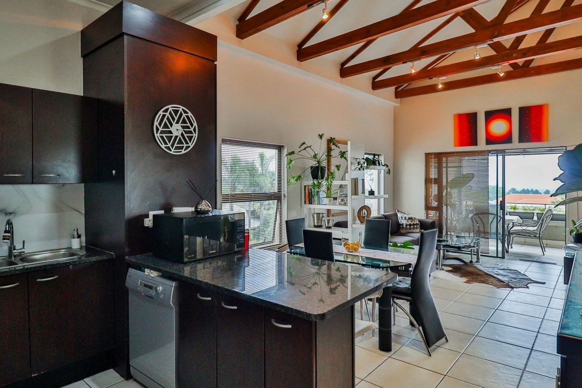 North facing Natural Light Stunning 2 bed 2 bath with Breath taking Magaliesburg Views in this lovely Millwood Lifestyle Estate - Photo 3