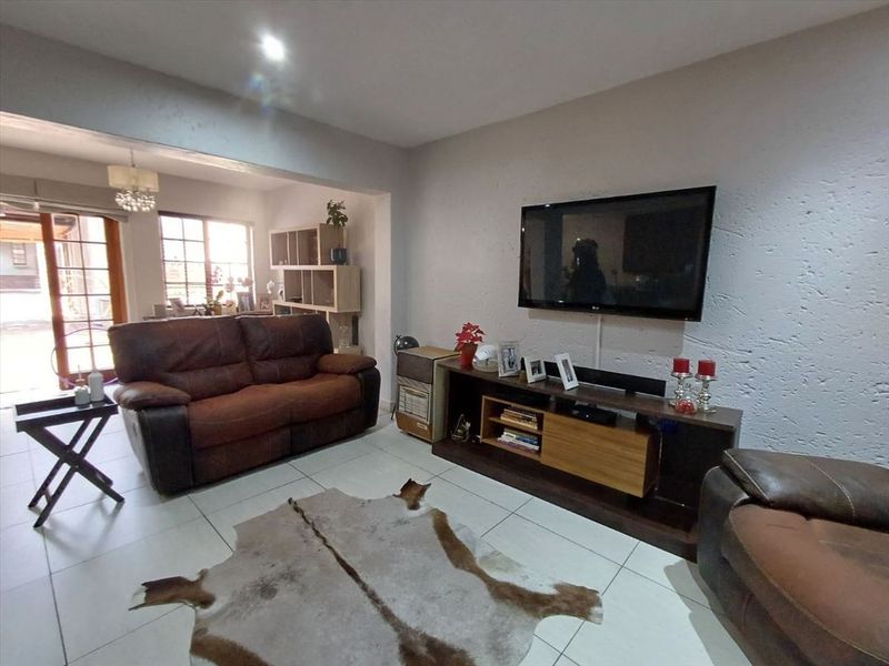 Charming Family Home with Timeless Appeal and Practical Comforts - Photo 2