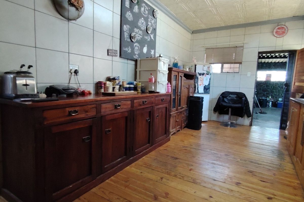 Charming Farm-Style Living with a House & Endless Potential. - Photo 4