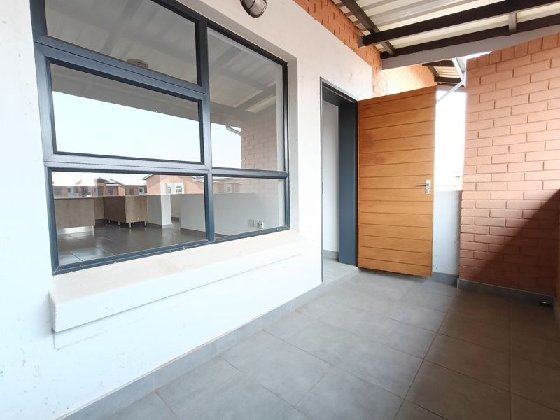 Modern 2-Bedroom Apartment | Second Floor with Open Balcony | Olive Wood North - Photo 9