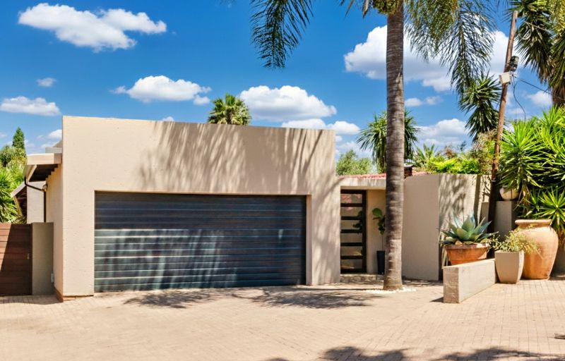 Luxurious four-bedroom family home with solar power, sparkling pool, and exceptional entertainment spaces in secure boomed area