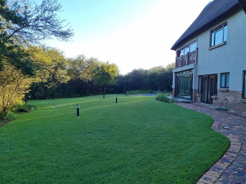 Stunning Family Home in the Sought-After Boschenvaal River Front Lodge - Photo 3