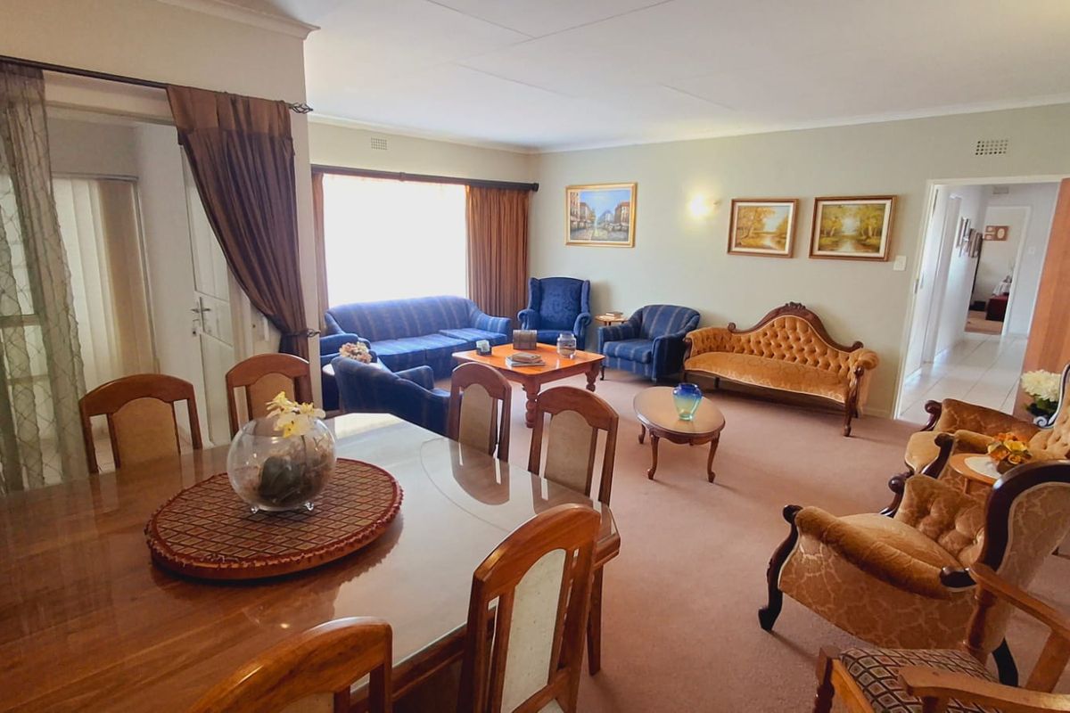 "Well-maintained four-bedroom home with flat walking distance to schools."p - Photo 2