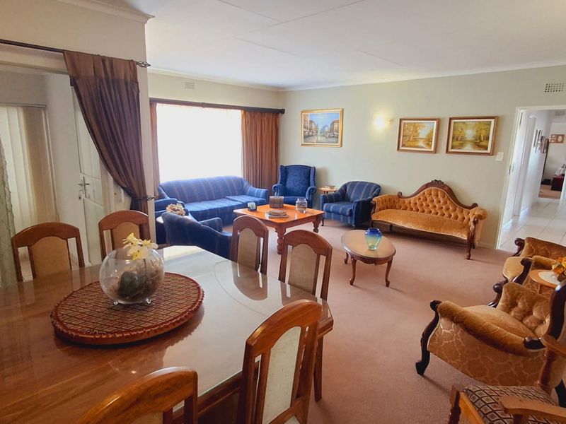 "Well-maintained four-bedroom home with flat walking distance to schools."p - Photo 2