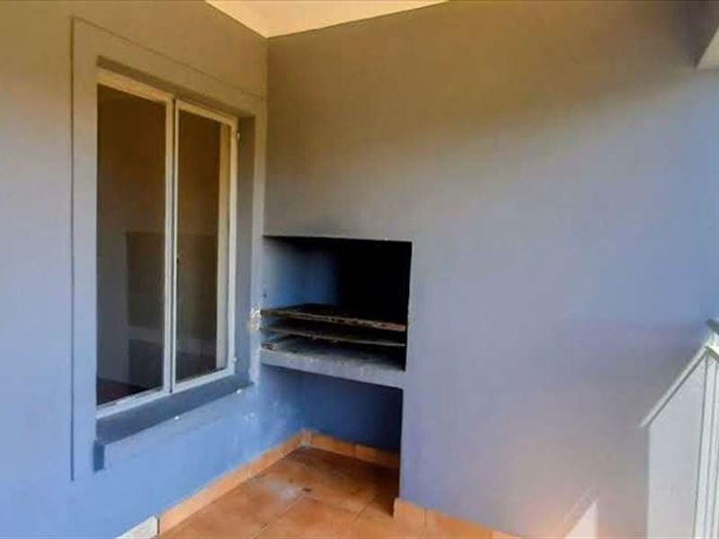 Charming 2-Bedroom Home with Pool and Modern Comforts - Photo 2