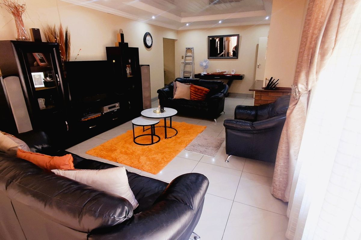 "3-bedroom home in a perfect location on the main road in Sasolburg, within walking distance to schools and all major amenities." - Photo 2