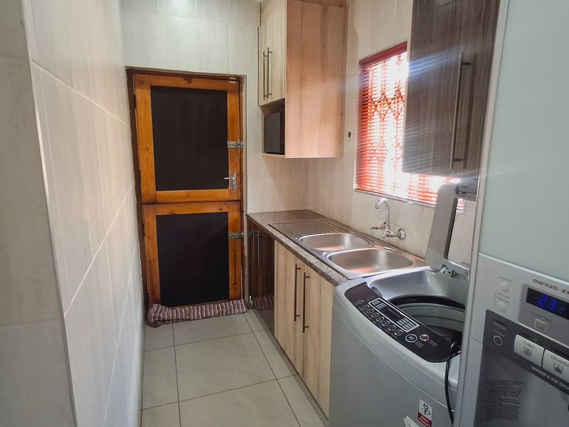 "3-bedroom home in a perfect location on the main road in Sasolburg, within walking distance to schools and all major amenities." - Photo 6