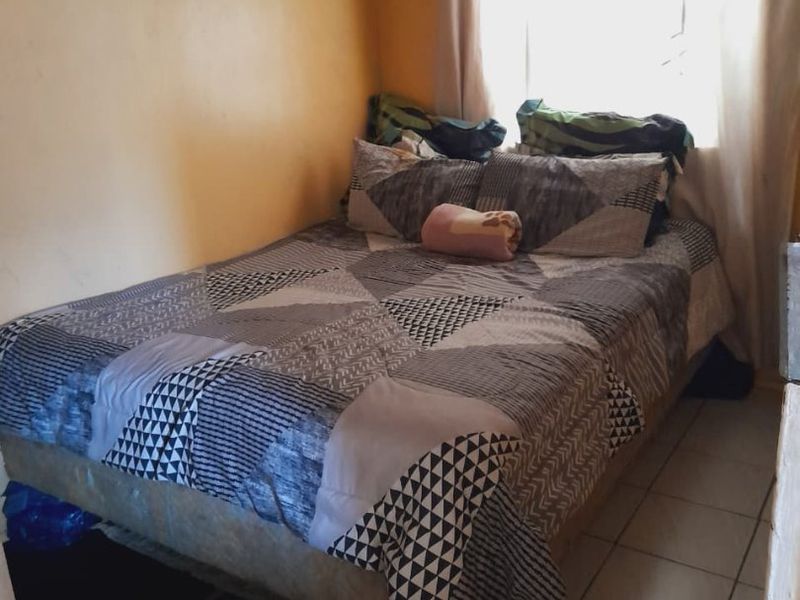 3 Bedroom Family Home with Spacious Yard and Great Potential - Photo 9