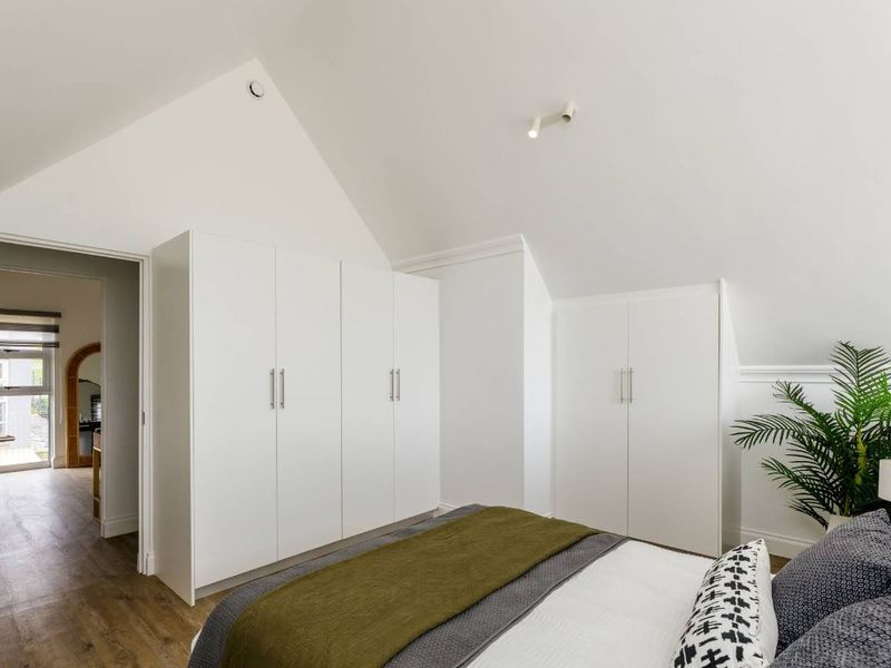 # COUNTRY GARDENS ESTATE   ## A Private Sanctuary of Sustainable Luxury | Lanseria | Nooitgedacht Mountains    **Where Prestige Meets Purpose.**   - Photo 7