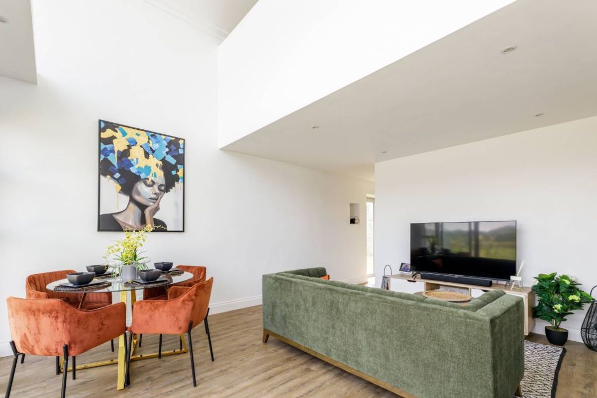 # COUNTRY GARDENS ESTATE   ## A Private Sanctuary of Sustainable Luxury | Lanseria | Nooitgedacht Mountains    **Where Prestige Meets Purpose.**   - Photo 4