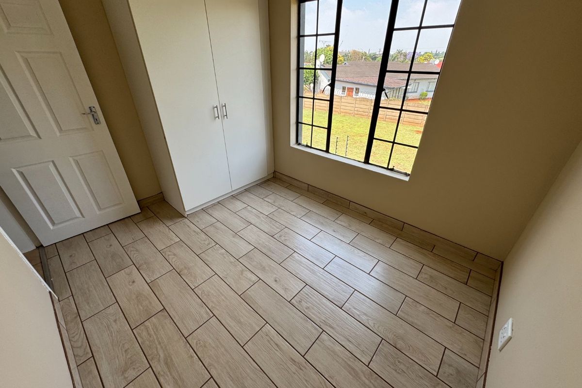 Neat and Cozy Starter Home with Modern Features - Photo 3