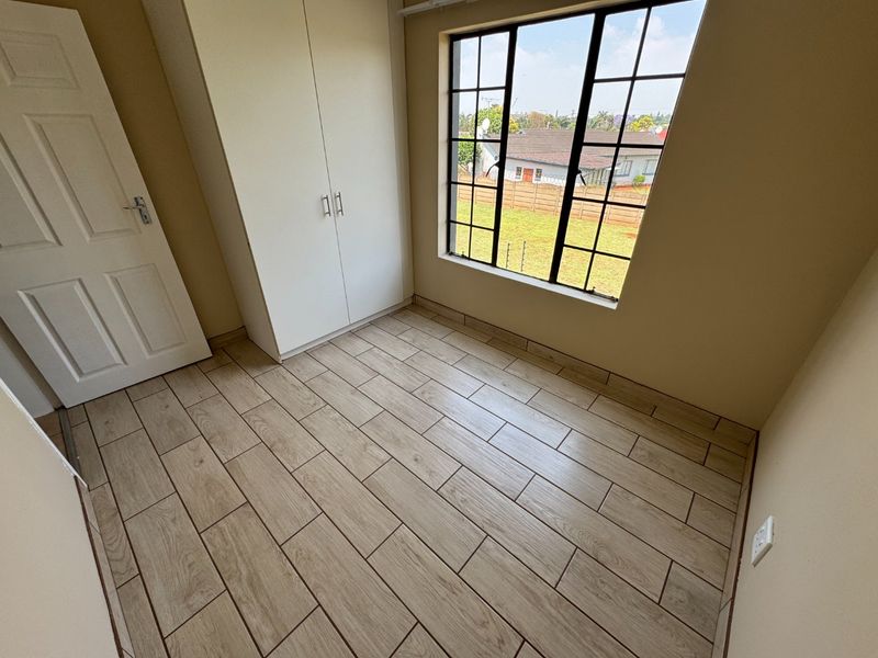 Neat and Cozy Starter Home with Modern Features - Photo 3