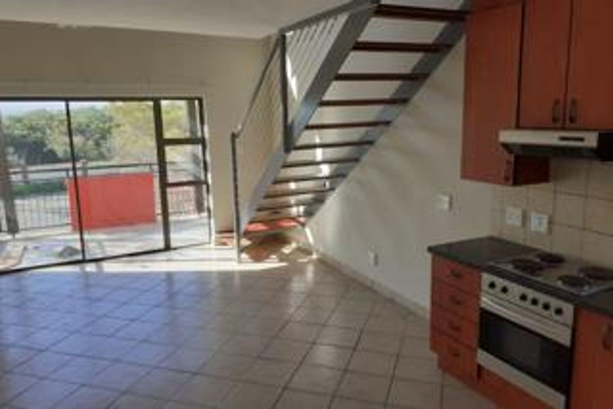 Chic Loft Living in a Secure Hazeldean Complex with Prime Amenities! - Photo 4