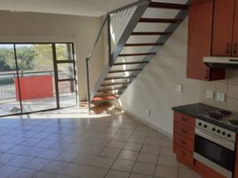 Chic Loft Living in a Secure Hazeldean Complex with Prime Amenities! - Photo 4