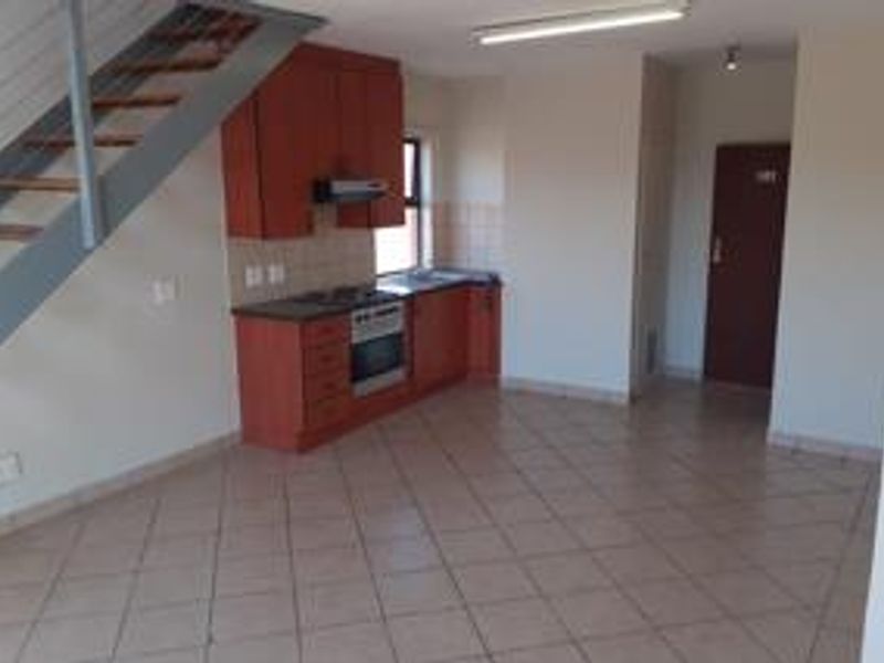 Chic Loft Living in a Secure Hazeldean Complex with Prime Amenities! - Photo 8