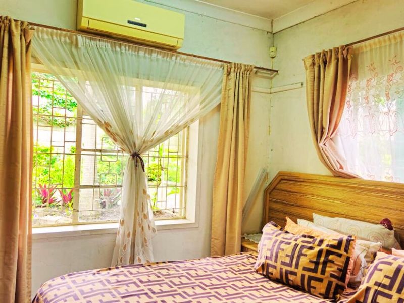 Spacious 3-Bedroom Home with Manicured Gardens and Fruit Trees - Photo 9