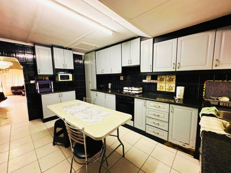 Ideally Situated Corner Plot Home with Dual Entrance Driveways - Photo 9