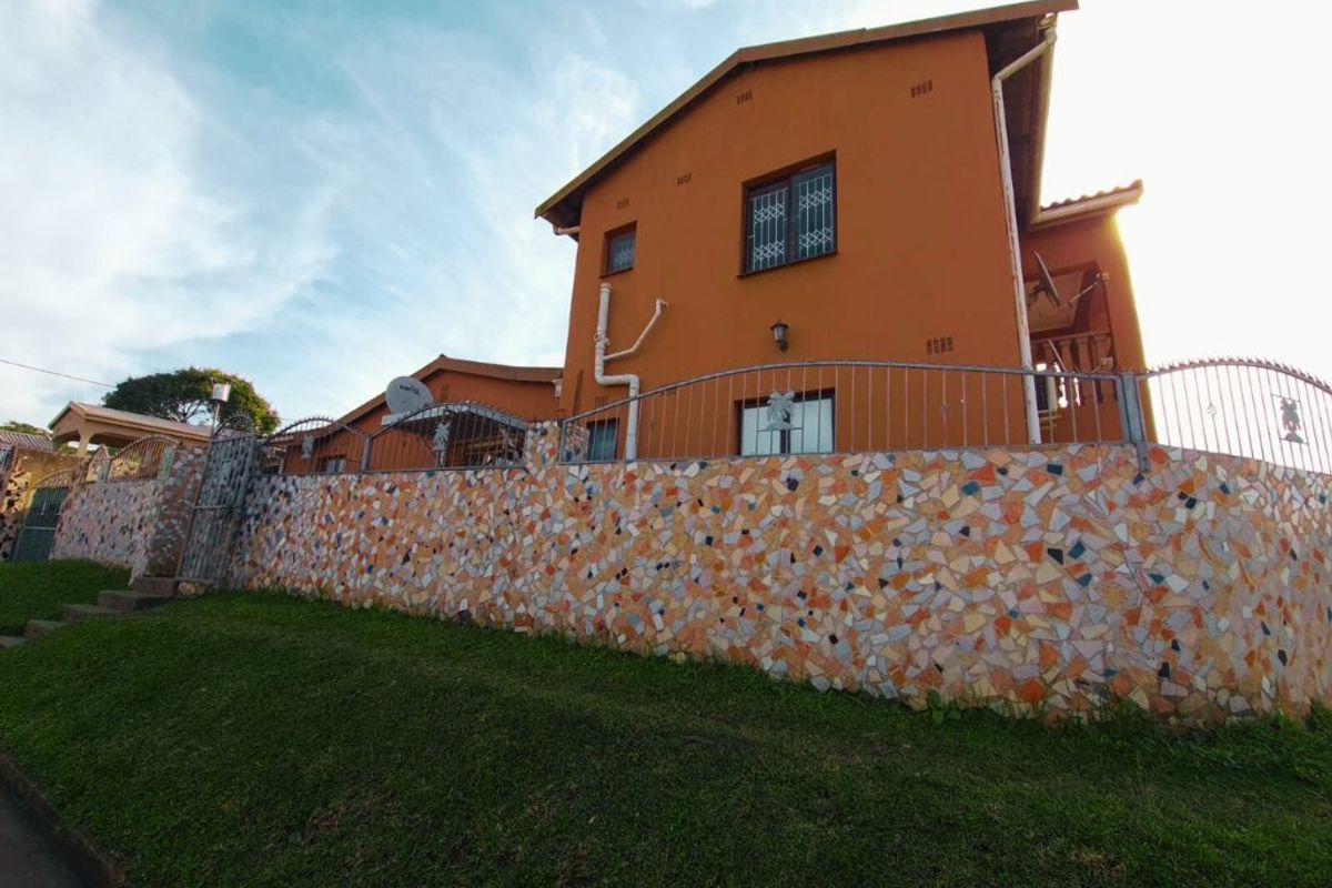 Ideally Situated Corner Plot Home with Dual Entrance Driveways - Photo 2