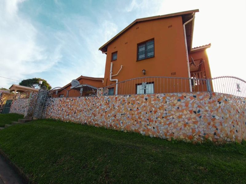 Ideally Situated Corner Plot Home with Dual Entrance Driveways - Photo 2