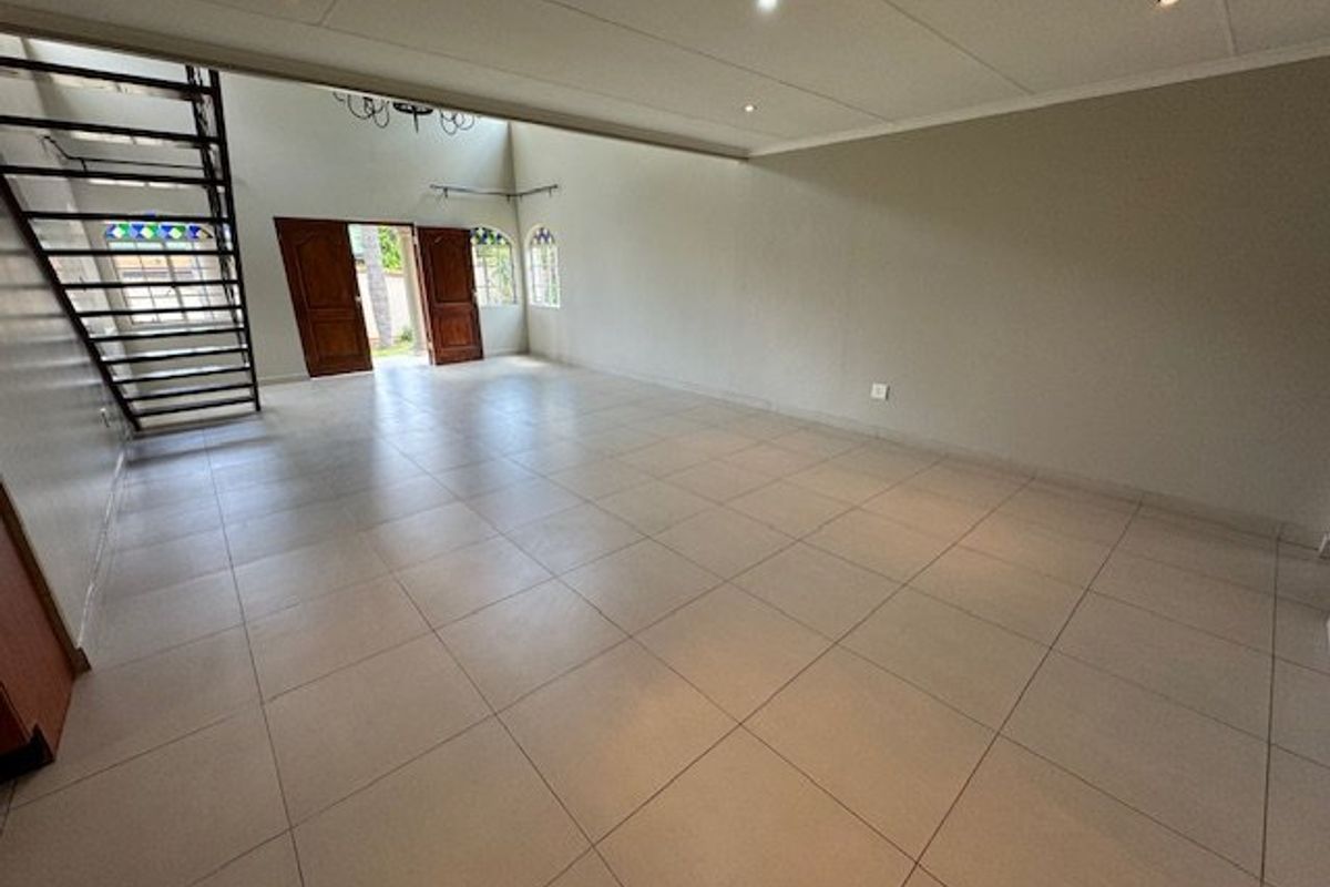 Elegant Family Home with Pool and Modern Amenities - Photo 4