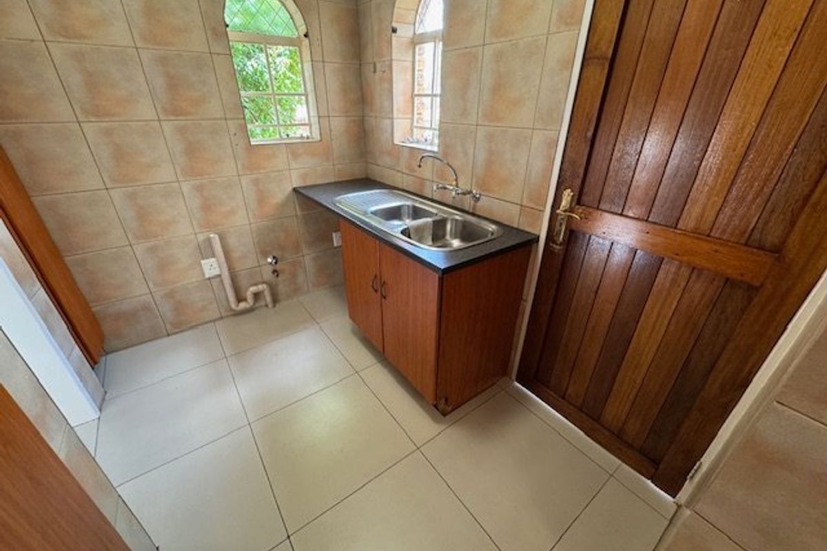 Elegant Family Home with Pool and Modern Amenities - Photo 3