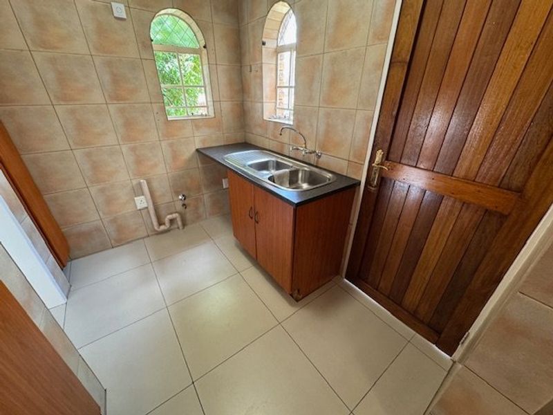 Elegant Family Home with Pool and Modern Amenities - Photo 3