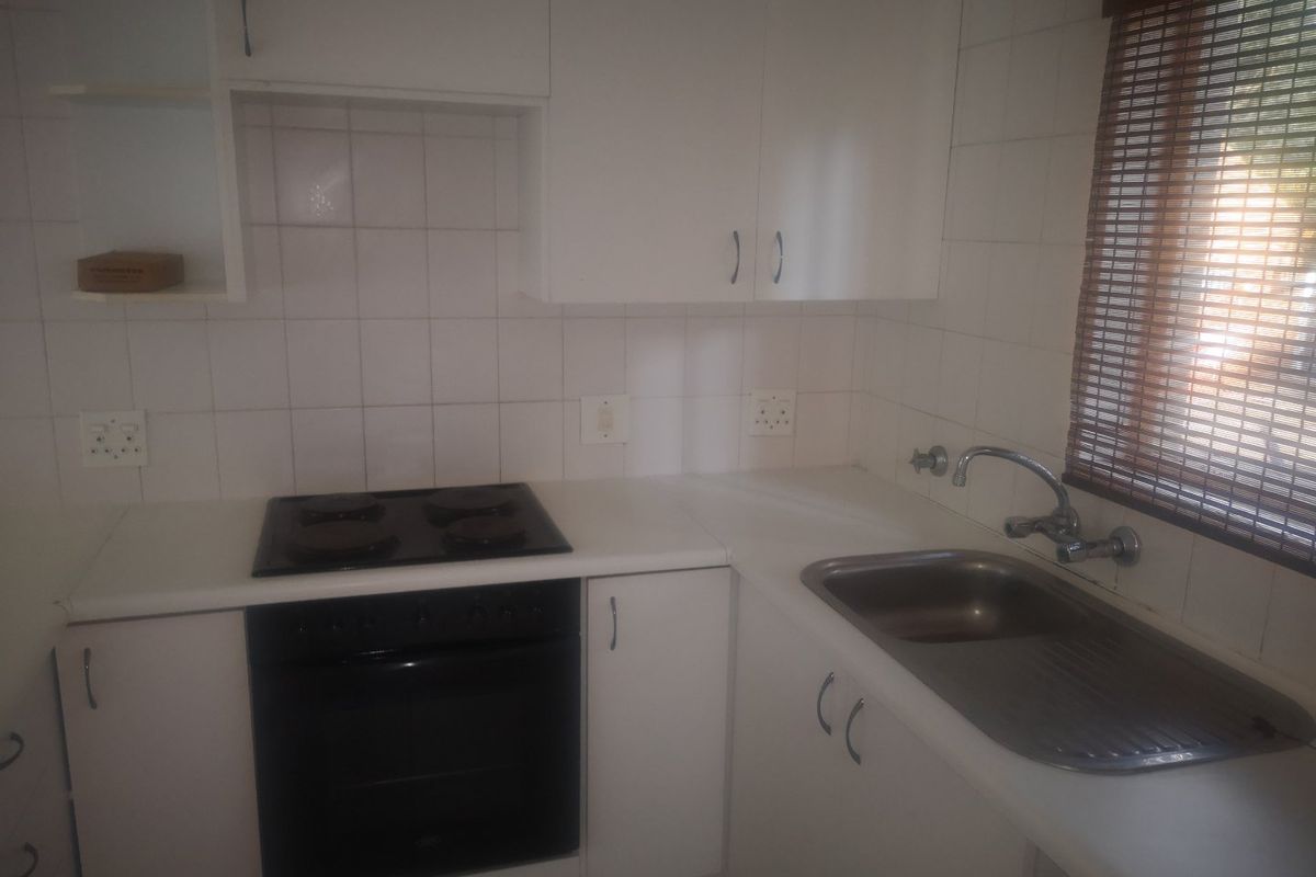 Serene 1-Bedroom Upstairs Unit in Secure Complex - Photo 3